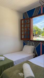Postel nebo postele na pokoji v ubytování Hospedaria São Jorge + 7 fotografií