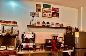 Kaffi- og teaðstaða á Acaima Café Lodge