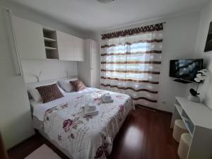 Postel nebo postele na pokoji v ubytování Apartman Gara