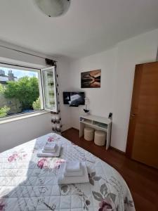 Postel nebo postele na pokoji v ubytování Apartman Gara