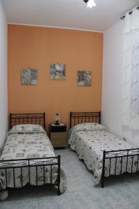 A bed or beds in a room at casa blu
