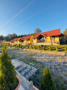 a row of houses with trees in front of them at Ler House Dilijan in Dilijan