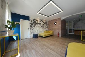Postel nebo postele na pokoji v ubytování Hotel-Restaurant Axion