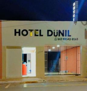 a hotel dublin sign on the side of a building at Hotel DüNIL in Araguaína