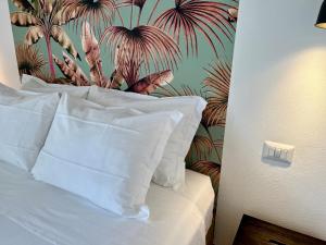 A bed or beds in a room at Dimora di Dante