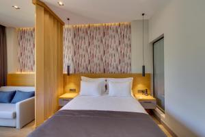 Cama ou camas em um quarto em Celeste Bella Luxury Hotel & Spa