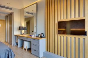 Cama ou camas em um quarto em Celeste Bella Luxury Hotel & Spa