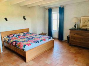 Posteľ alebo postele v izbe v ubytovaní Ferme de Jeanleix