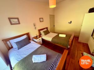 Letto o letti in una camera di Atlantic View Retreat