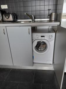 Kuchyň nebo kuchyňský kout v ubytování Ntelis Home