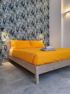 Postel nebo postele na pokoji v ubytování Borgo di Levante luxury apartments