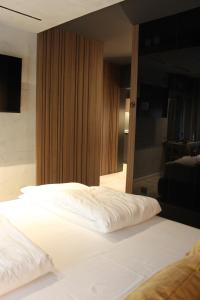 Una cama o camas en una habitación de Open Space