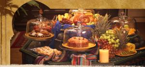 a display of fruits and vegetables in glass jars at El Morocco Inn & Spa in Desert Hot Springs