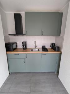 Η κουζίνα ή μικρή κουζίνα στο Ferienwohnung Dorfaue