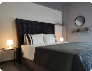 Postel nebo postele na pokoji v ubytování Rhodos City