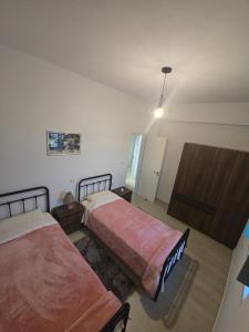 Postel nebo postele na pokoji v ubytování Sugar Stone House