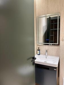 Koupelna v ubytování SOLs Center Rooms