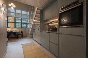 Unity Hammarby Sjöstad - A Studio Hotel的厨房或小厨房
