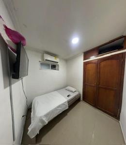 TV a/nebo společenská místnost v ubytování Hostal Viva Mar