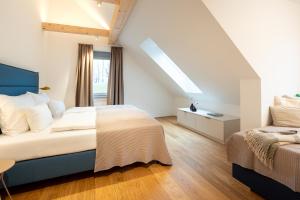 Ένα ή περισσότερα κρεβάτια σε δωμάτιο στο Apfelland Hideaways
