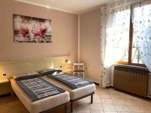 Postel nebo postele na pokoji v ubytování Casa Sara
