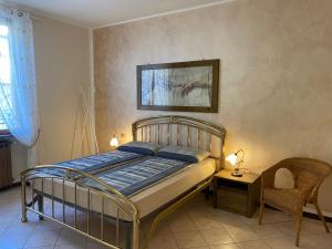 Postel nebo postele na pokoji v ubytování Casa Sara