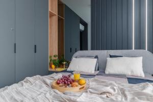 Łóżko lub łóżka w pokoju w obiekcie Apartament Family Green z garażem, klimatyzacją do 6 osób