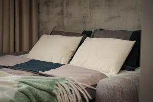 Łóżko lub łóżka w pokoju w obiekcie Apartament Family Green z garażem, klimatyzacją do 6 osób