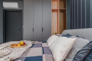 Łóżko lub łóżka w pokoju w obiekcie Apartament Family Green z garażem, klimatyzacją do 6 osób