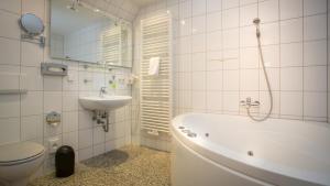 Koupelna v ubytování Hotel Stettiner Hof + 37 fotografií