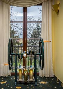 a gym with weights in front of a window at Hotel Stettiner Hof in Greifswald