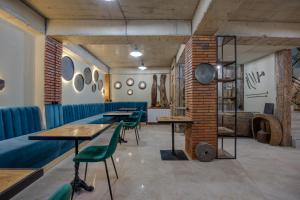 Area soggiorno di Regraph Hotel