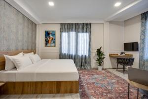 TV o dispositivi per l'intrattenimento presso Regraph Hotel