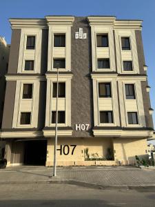 a large building with the number on it at Dar ASEEL دار أصيل in Jeddah