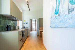 Η κουζίνα ή μικρή κουζίνα στο Apfelland Hideaways