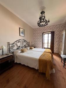 Postel nebo postele na pokoji v ubytování La Casona de Villanueva de Pría