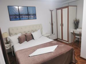 Postel nebo postele na pokoji v ubytování Casa Lac de Verde