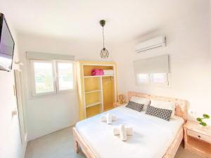 Krevet ili kreveti u jedinici u okviru objekta Excelent Apartment with Pool