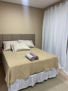 Katil atau katil-katil dalam bilik di Studio completo! Conforto e mobilidade!