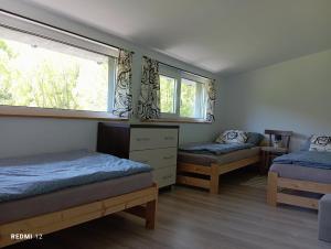 Postel nebo postele na pokoji v ubytování Jarkowice 4x4 Noclegi