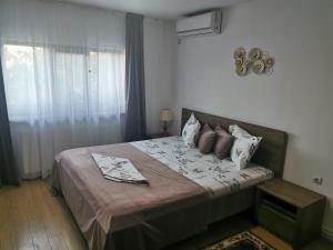 Postel nebo postele na pokoji v ubytování Casa Lac de Verde