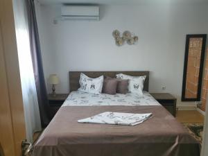 Postel nebo postele na pokoji v ubytování Casa Lac de Verde