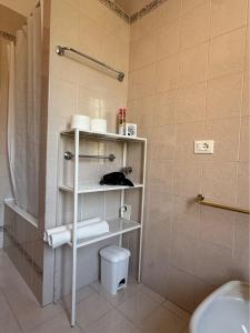 Koupelna v ubytování Giove Rooms + 22 fotografií