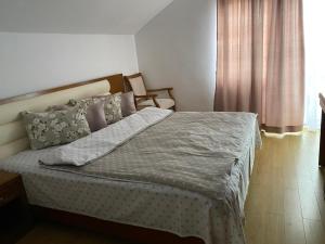 Postel nebo postele na pokoji v ubytování Casa Lac de Verde