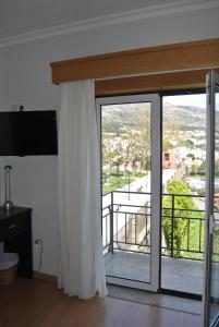 Uma varanda ou terraço em Hotel Covilhã Jardim