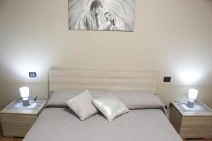 Postel nebo postele na pokoji v ubytování Casa vacanza Francesca con vista mare