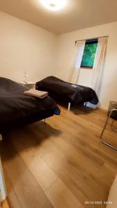Voodi või voodid majutusasutuse Sleepindenmark toas