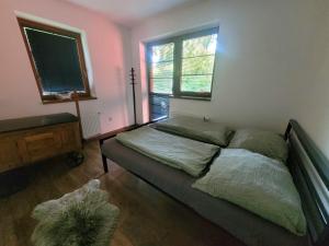 Postel nebo postele na pokoji v ubytování Apartmán Sova