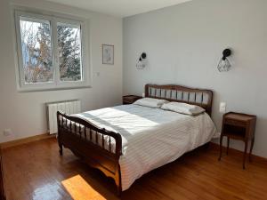 Postel nebo postele na pokoji v ubytování La Terrasse du Serre