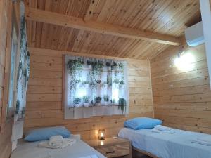 Posteľ alebo postele v izbe v ubytovaní Cormoranos Apartments Eco Green + 37 fotografií